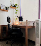 Therapyworthwhile office interior featuring a tissue box and marble coasters on a wooden table.